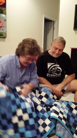 My mom freaking out over the quilt I made