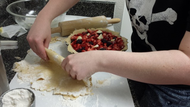 Move the folded crust onto the pie