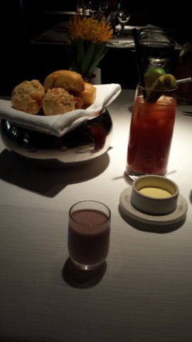 Pre-lunch spread, with bread basket, Steven's fancy bloody mary, and smoothie shots!