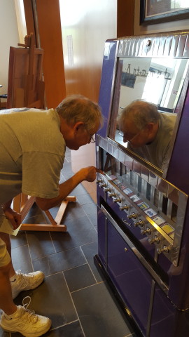Dad trying out the art vending machine