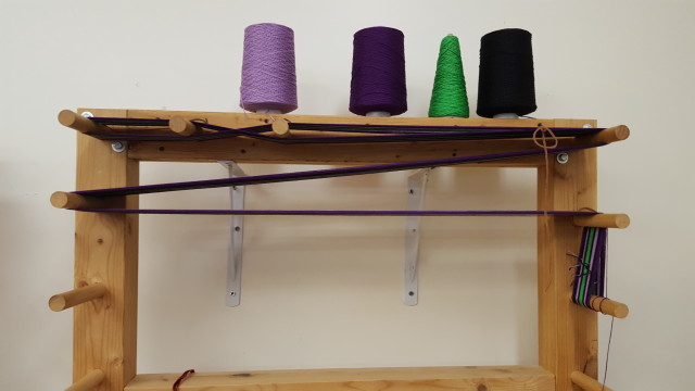 This is how you measure it out/set it up to go on the loom