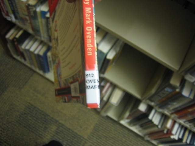 I can't help feeling like it might be illegal to take pictures of books in a library without checking them out